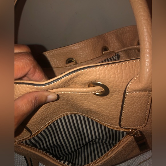 Handbag with black and white stripes inside; classy bag can dress up or down - Picture 6 of 8